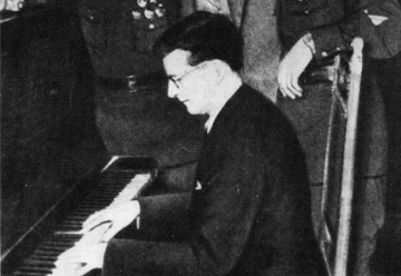 Shostakovich plays for bomber pilots below picture of Stalin